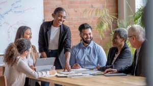 Diverse team collaborating during a meeting and sharing fun staff training ideas to boost engagement and teamwork in 2025.