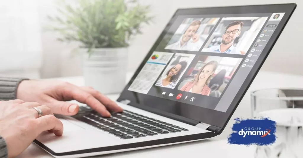 Person typing on laptop during a video meeting representing engagement activities for remote teams that boost connection and productivity.